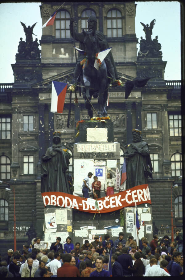 Czechoslovakians Hold Flags Against Approaching Russians