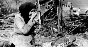 Old Woman Cries Over Leningrad Wreckage