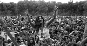 Woodstock Audience Member With Peace Signs