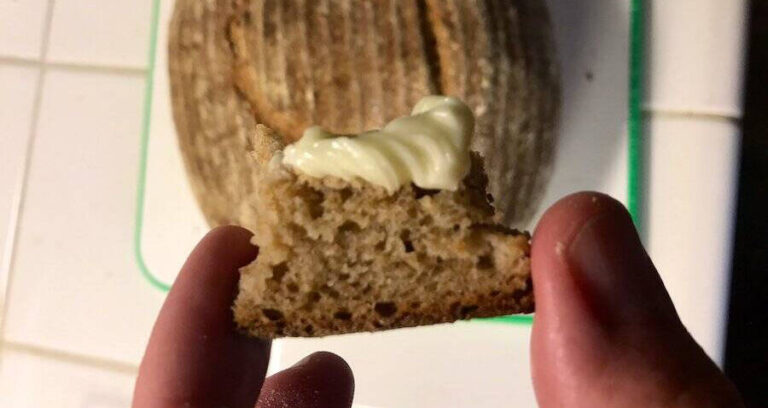 Hand Holding Bread And Butter