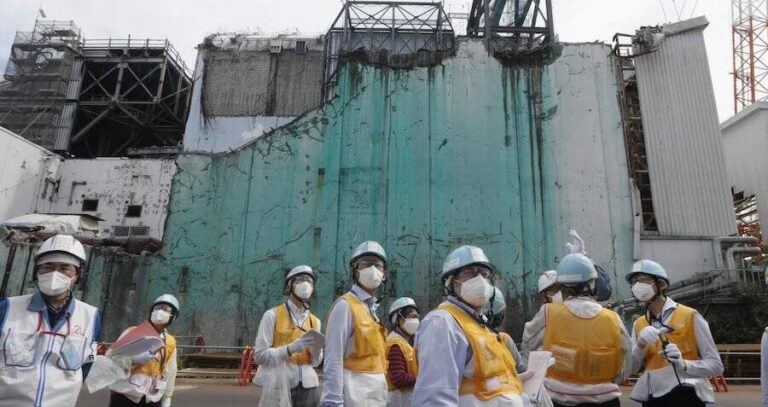 Fukushima Workers And Nuclear Reactor