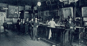 Men In Old Timey Chicago Bar Featured
