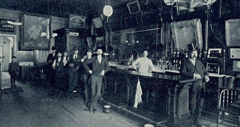 Men In Old Timey Chicago Bar Featured