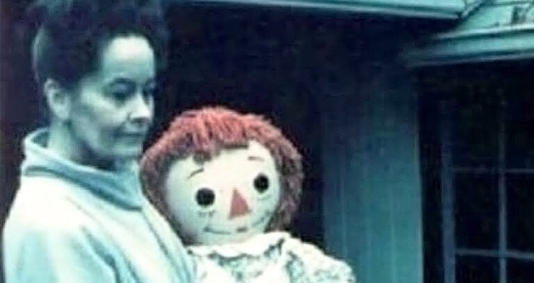 Lorraine Warren Holding Annabelle Featured