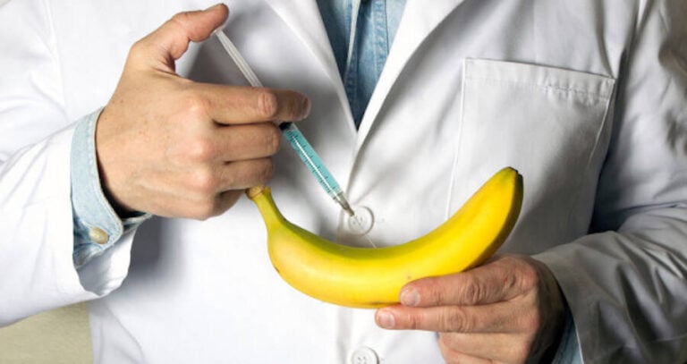 Doctor Injecting A Banana