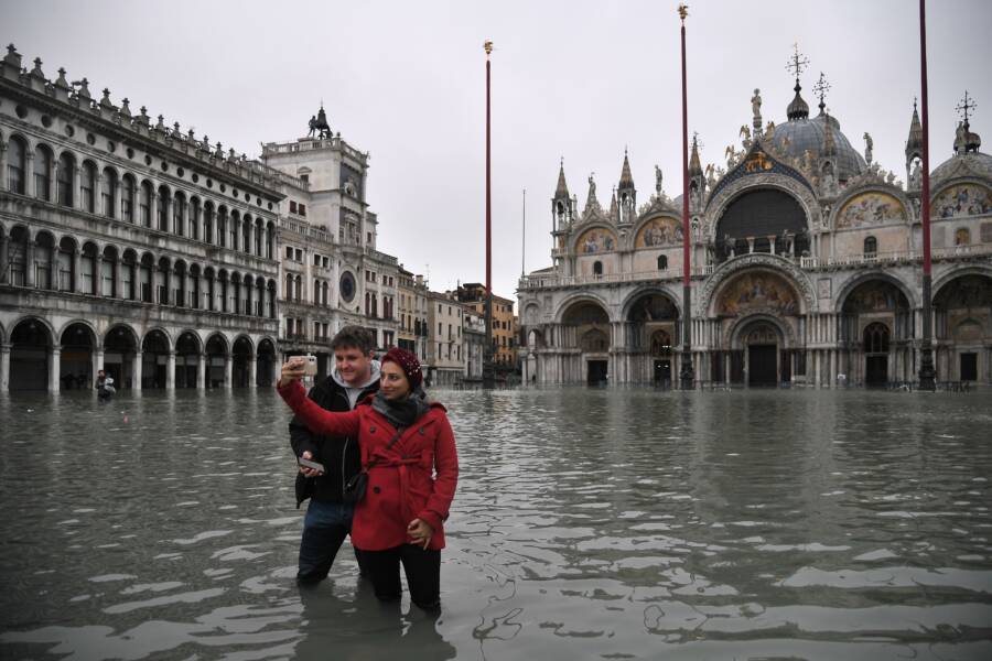 Tourists Selfie In Venice Flood