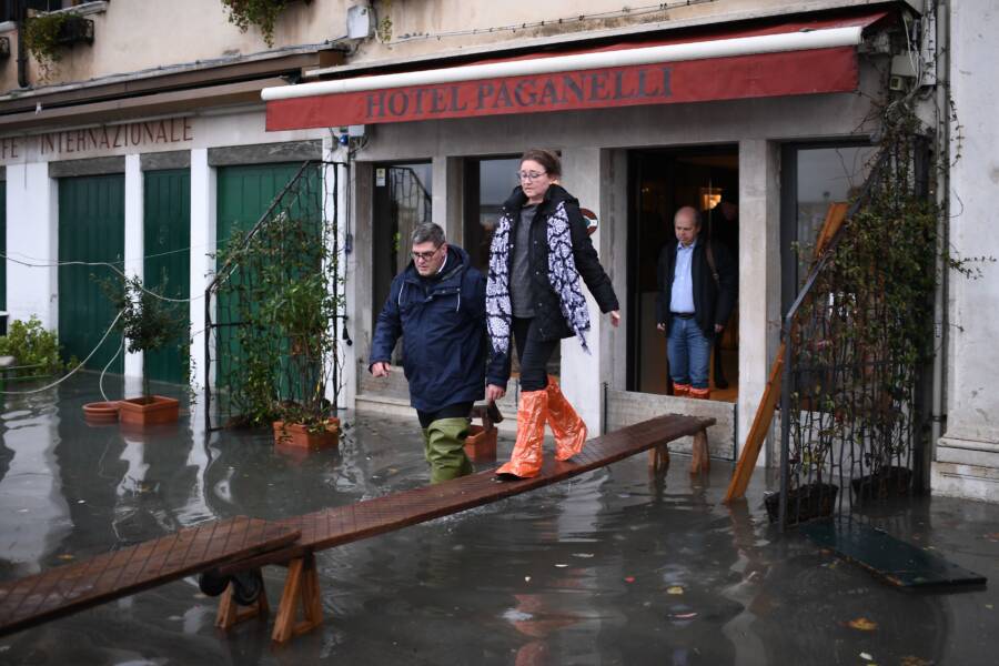 Tourists Walk Above Venice Flood