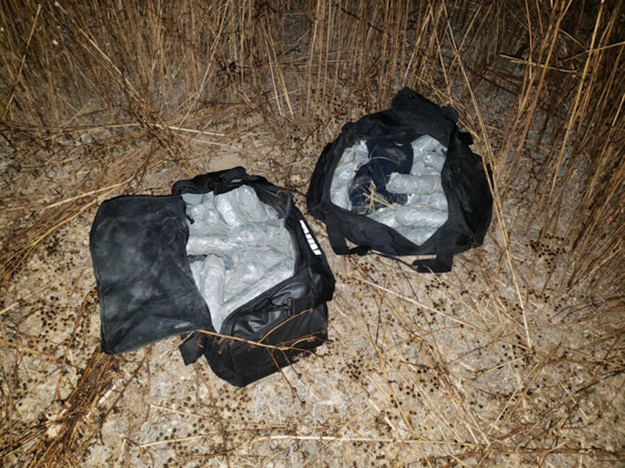 Two Duffel Bags Full Of Methamphetamine