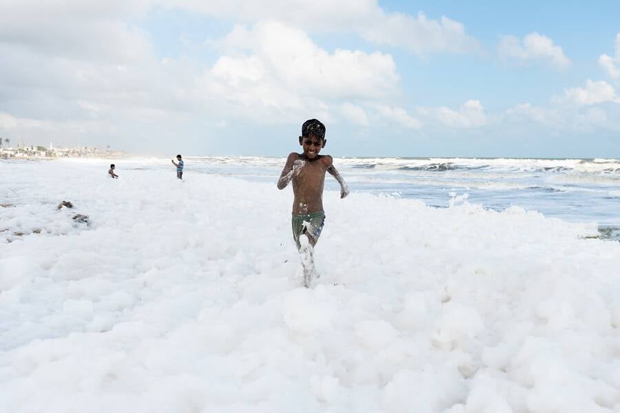 Child Playing In The Toxic Foam