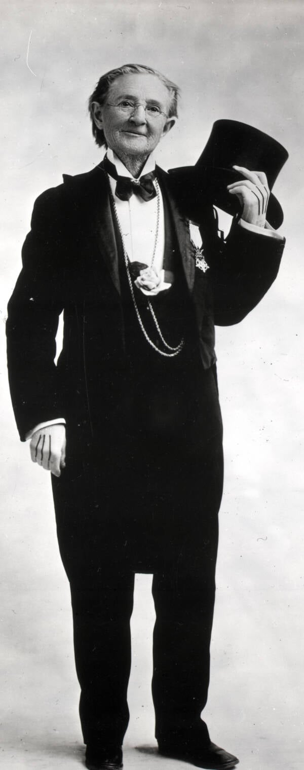 Mary Edwards In A Suit With Top Hat