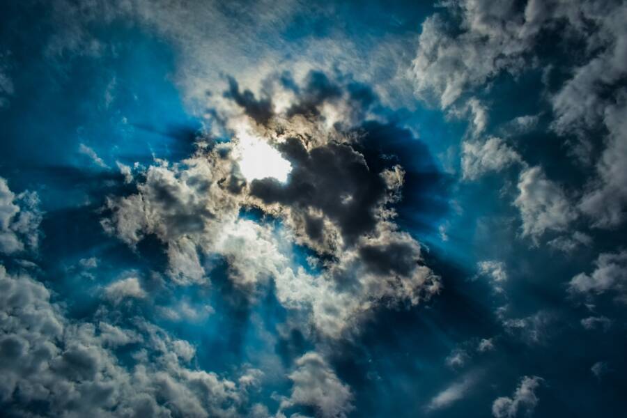 Sun Shining Through The Clouds