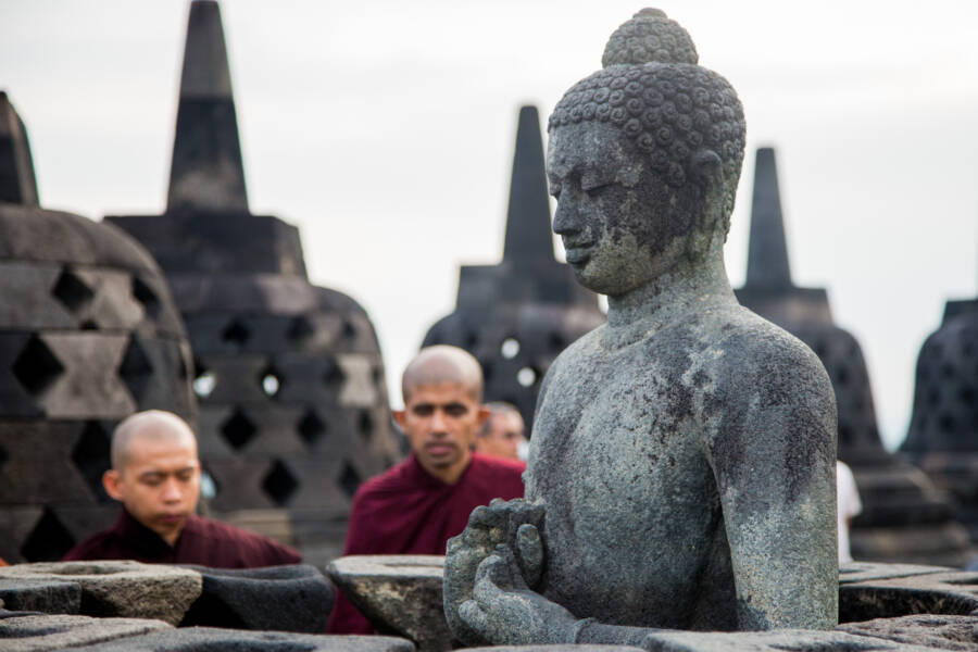 Monks And Buddha Statue