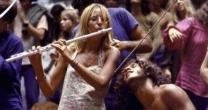 Woman Playing The Flute At Woodstock