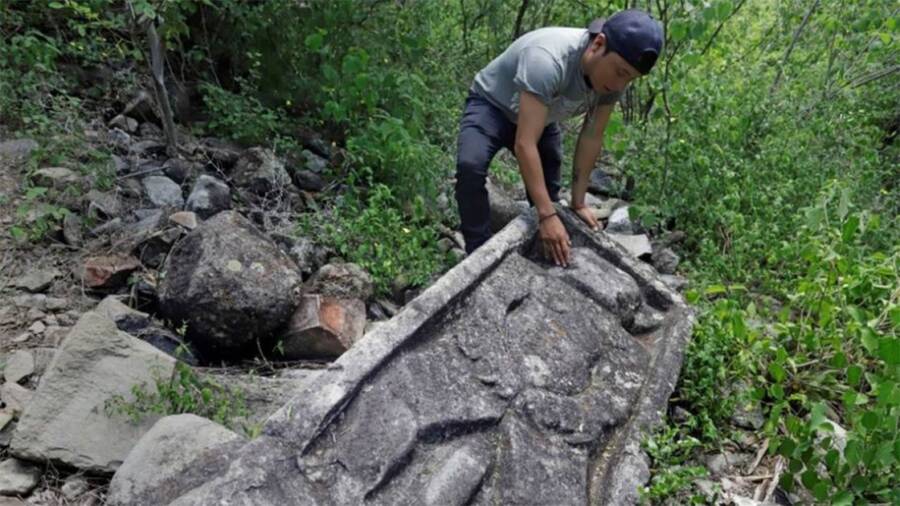 Archaeologist With Zapotec Artifact