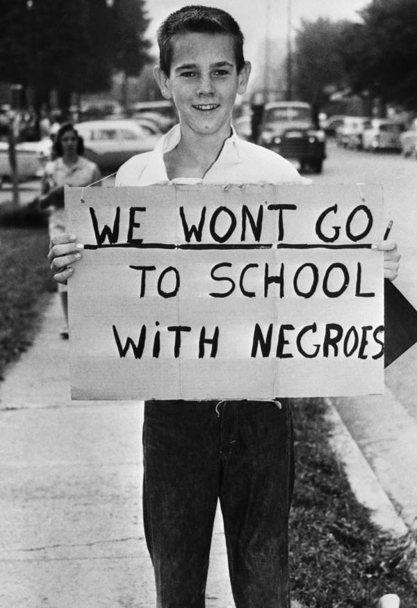 Boy With Segregation Sign