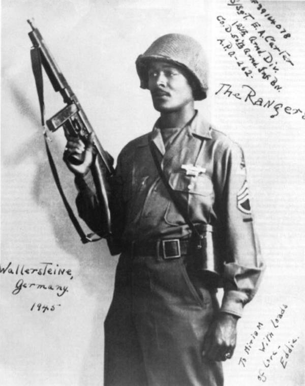Edward Carter Carrying Rifle