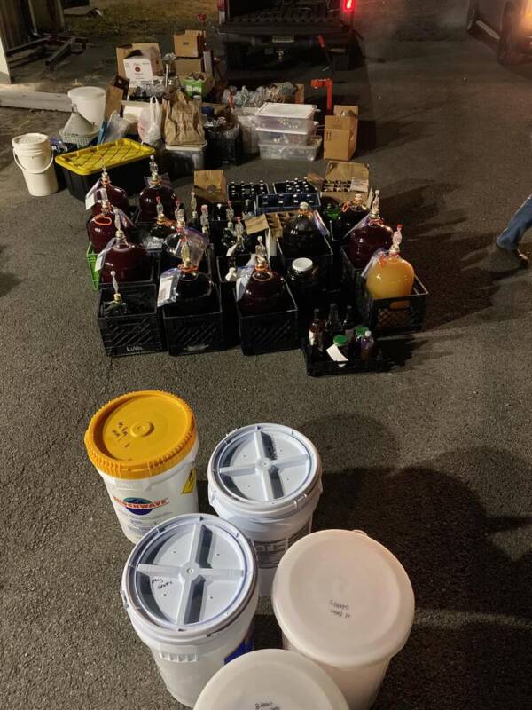 Buckets And Bottles Of Illegal Wine