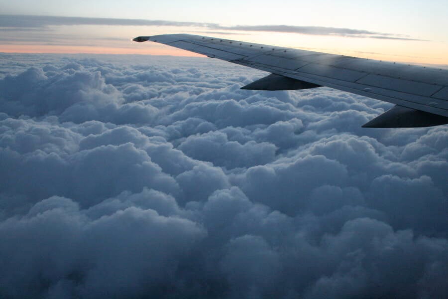 Airplane Wing And Clouds