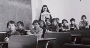 Children Before Nun In Reform School Featured