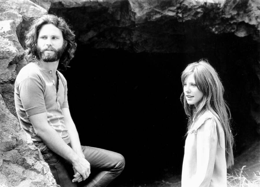 Ray Manzarek stands in front of the grave of Jim Morrison, surrounded  News Photo - Getty Images