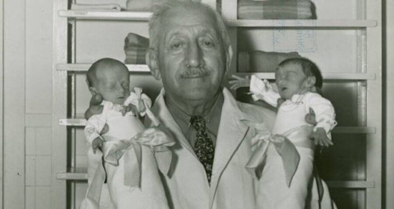Martin Couney Holding Babies