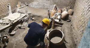 Archaeologist In Pompeii Slave Room