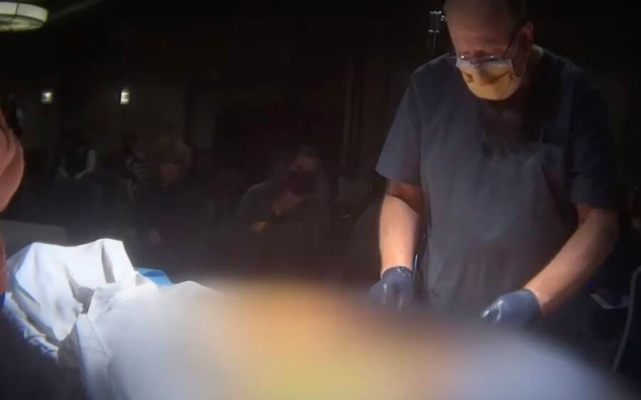 Doctor Performing David Saunders Autopsy