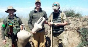 Ukrainian Soldiers Holding Greek Urns