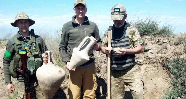 Ukrainian Soldiers Holding Greek Urns