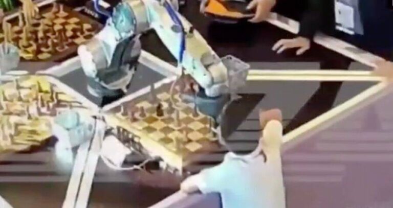 Christopher Playing Against Chess Robot