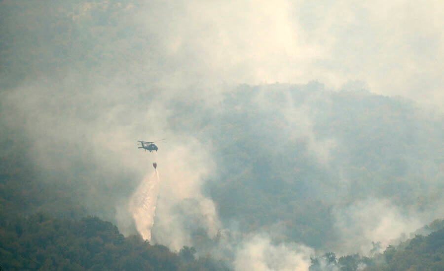 Helicopter Dousing Slovenian Fire