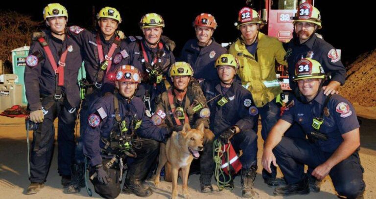Cesar Posting With Firefighters
