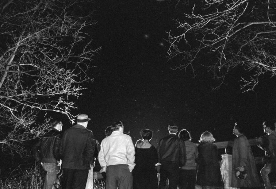 People Watching The Night Sky