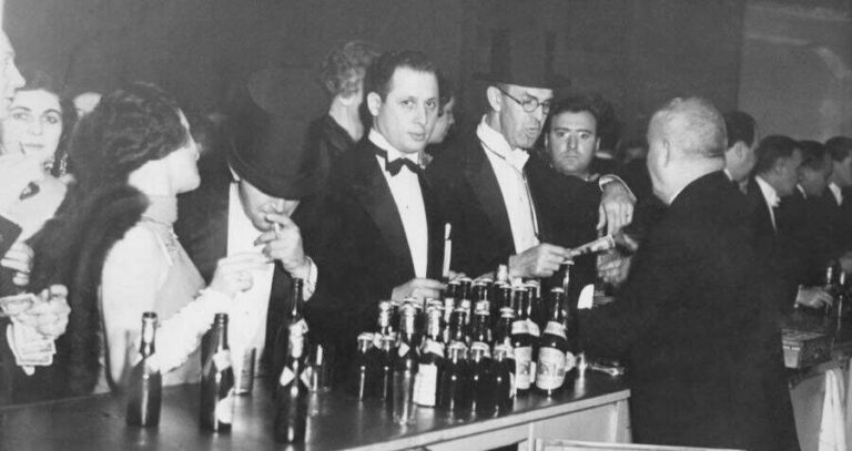 Guests Inside A Speakeasy