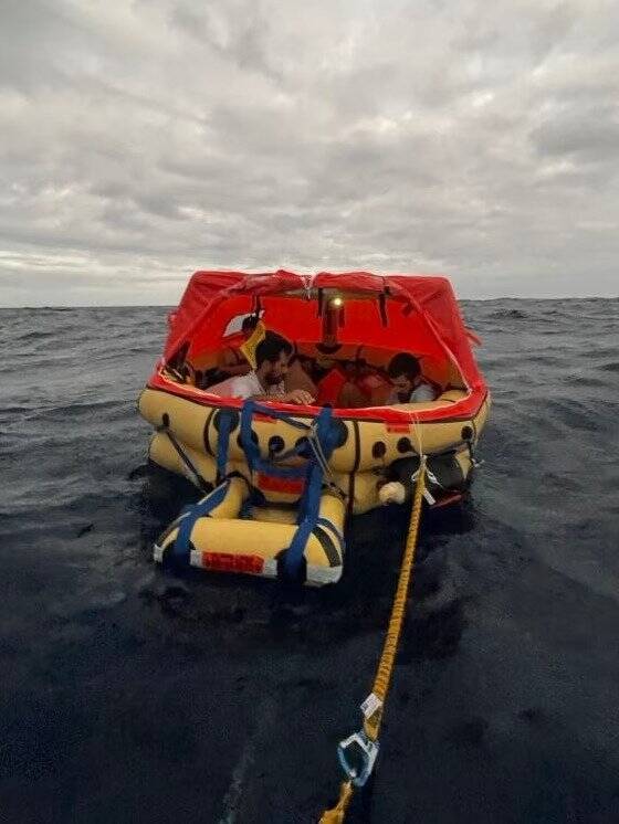 Crew Members In Raft
