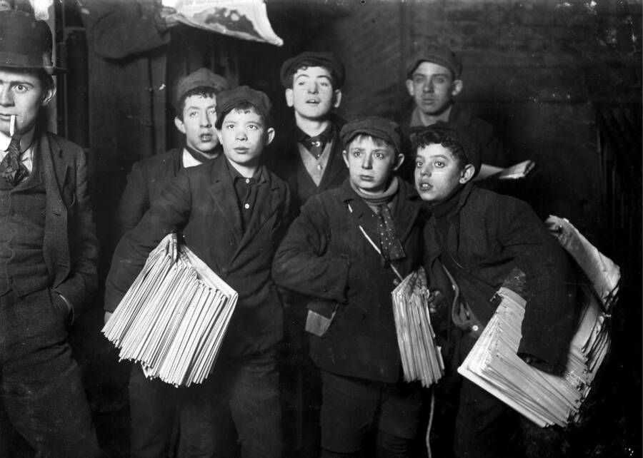 Group Of Newsboys Holding Papers
