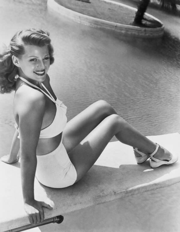 Rita Hayworth By A Pool