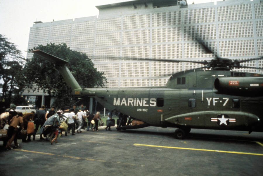 Evacuees Boarding A Helicopter During The Fall Of Saigon