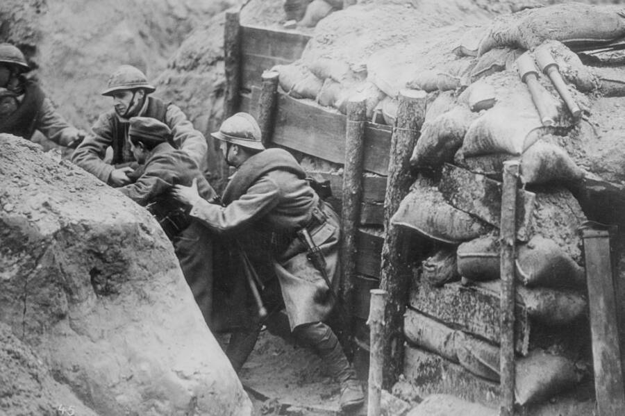 French Soldiers Capturing Germans In World War I Trenches