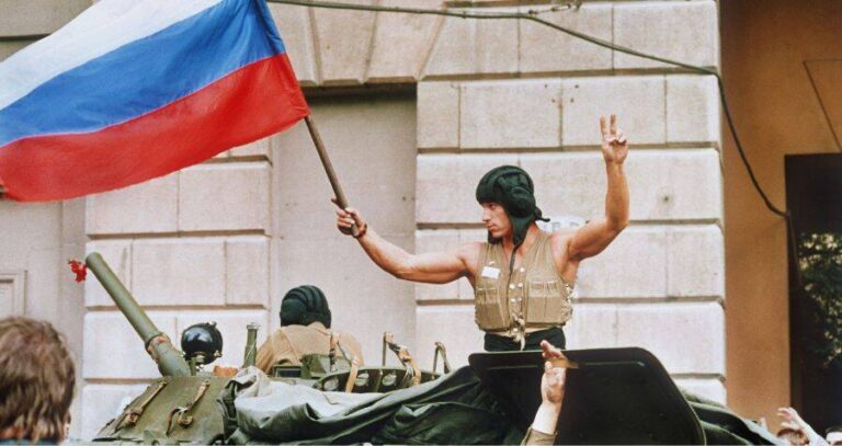 Man Holding Russian Flag