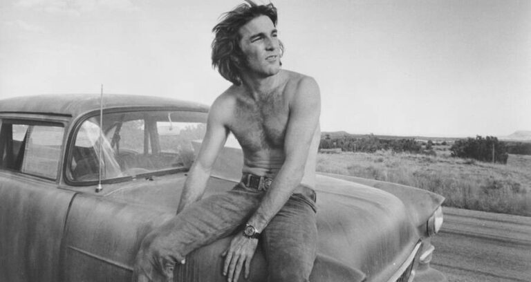 Dennis Wilson On A Car