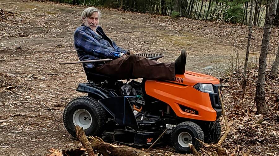Geoffrey Holt On A Lawnmower