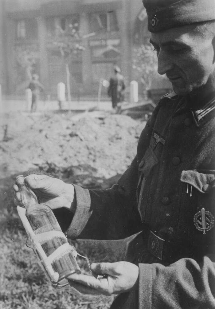 Soldier Holding A Bottle Bomb