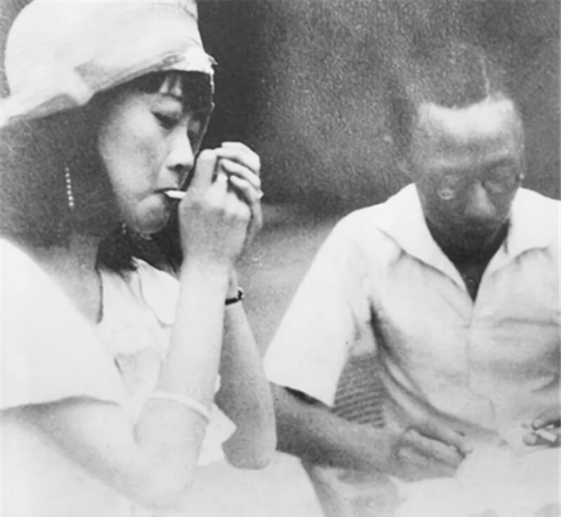 Empress Wanrong Smoking Cigarette