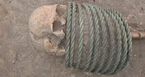 Skeleton With Bronze Neck Rings Featured