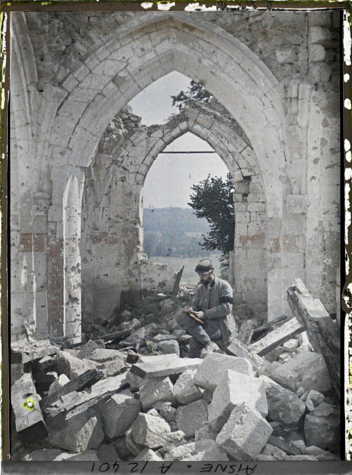 Soldier Writing In Rubble