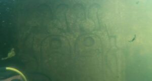 Underwater Rock Carvings Featured