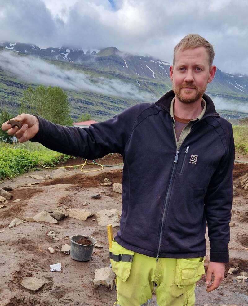 Archaeologist Showing Off The Toy