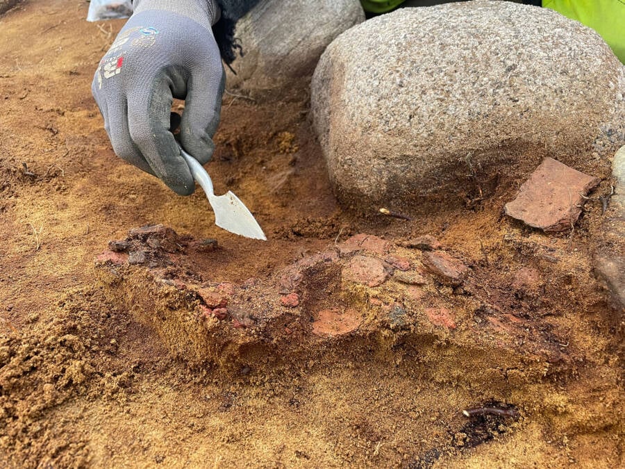 Archaeologists Revealing The Grave Markers