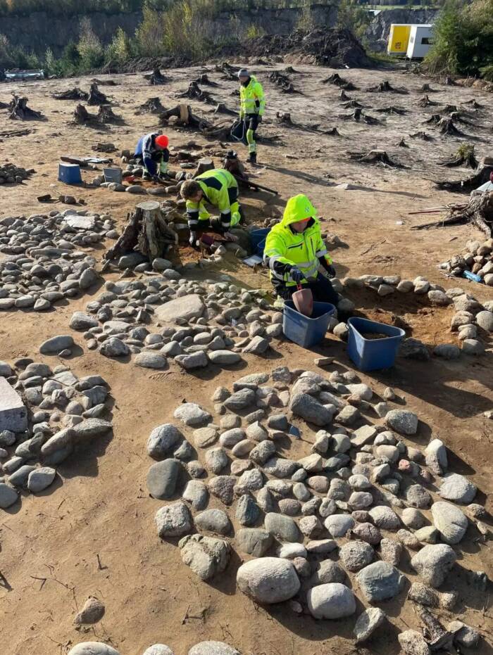 Archaeologists Working At The Site